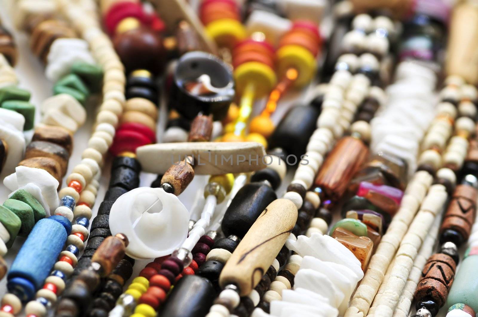 Wood and seashell bead necklaces close up