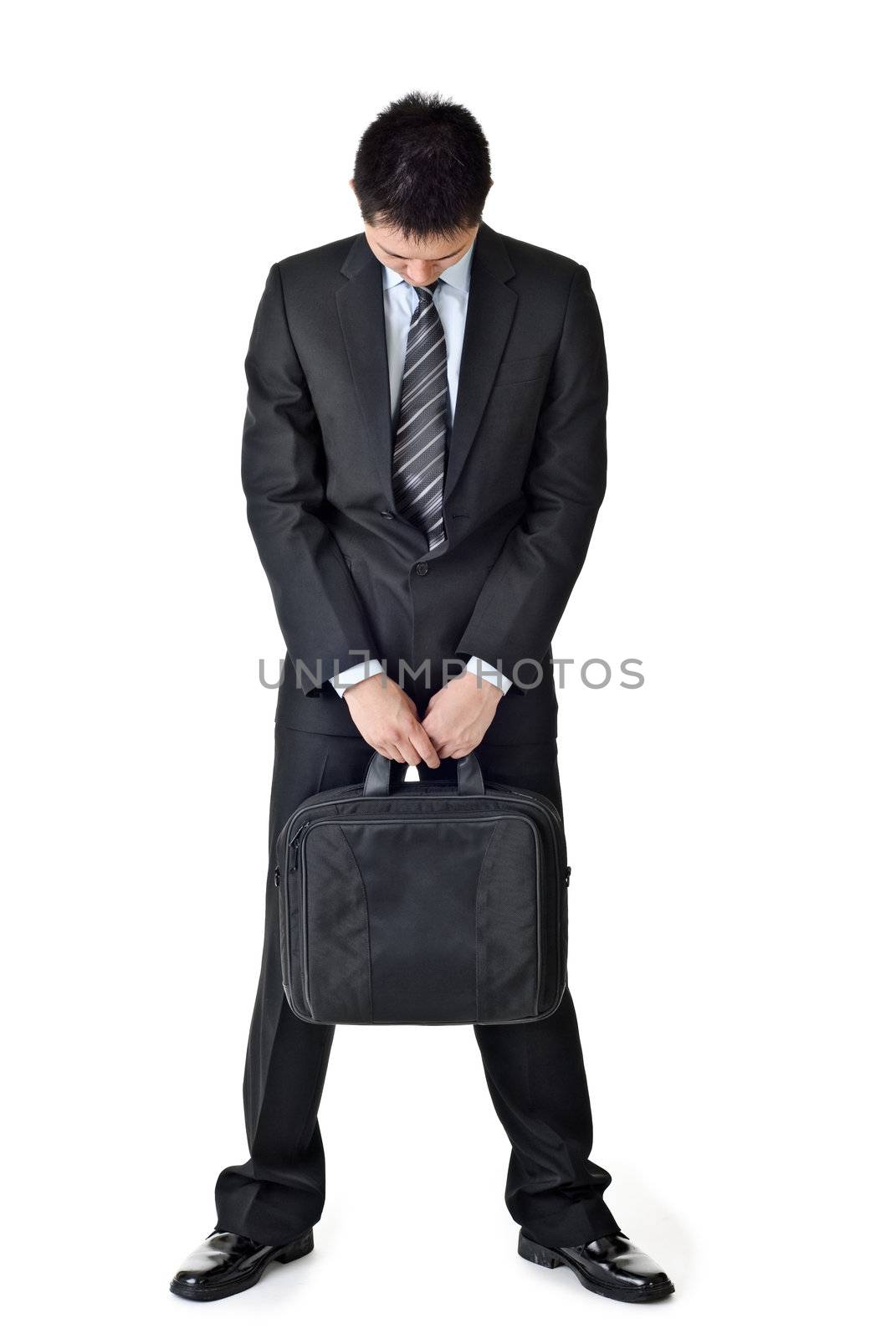 Sad business man, full length portrait isolated white background.
