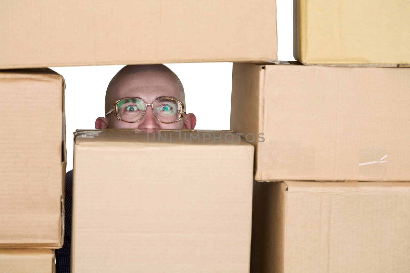 Man looking through pile of cardboard boxes by pzaxe