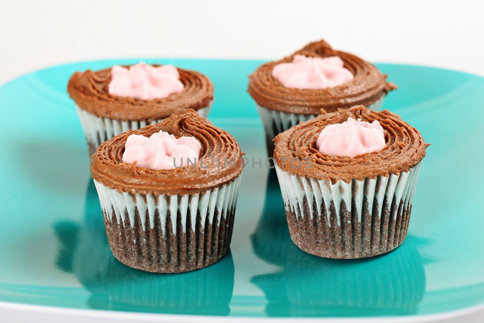 yummy raspberry cream filled cupcakes by creativestock
