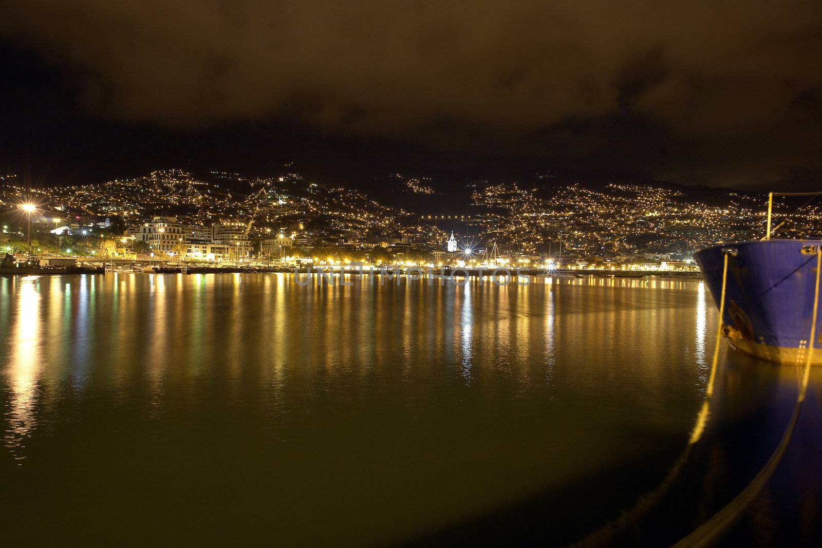 Night photo of a city by the sea in Funchal