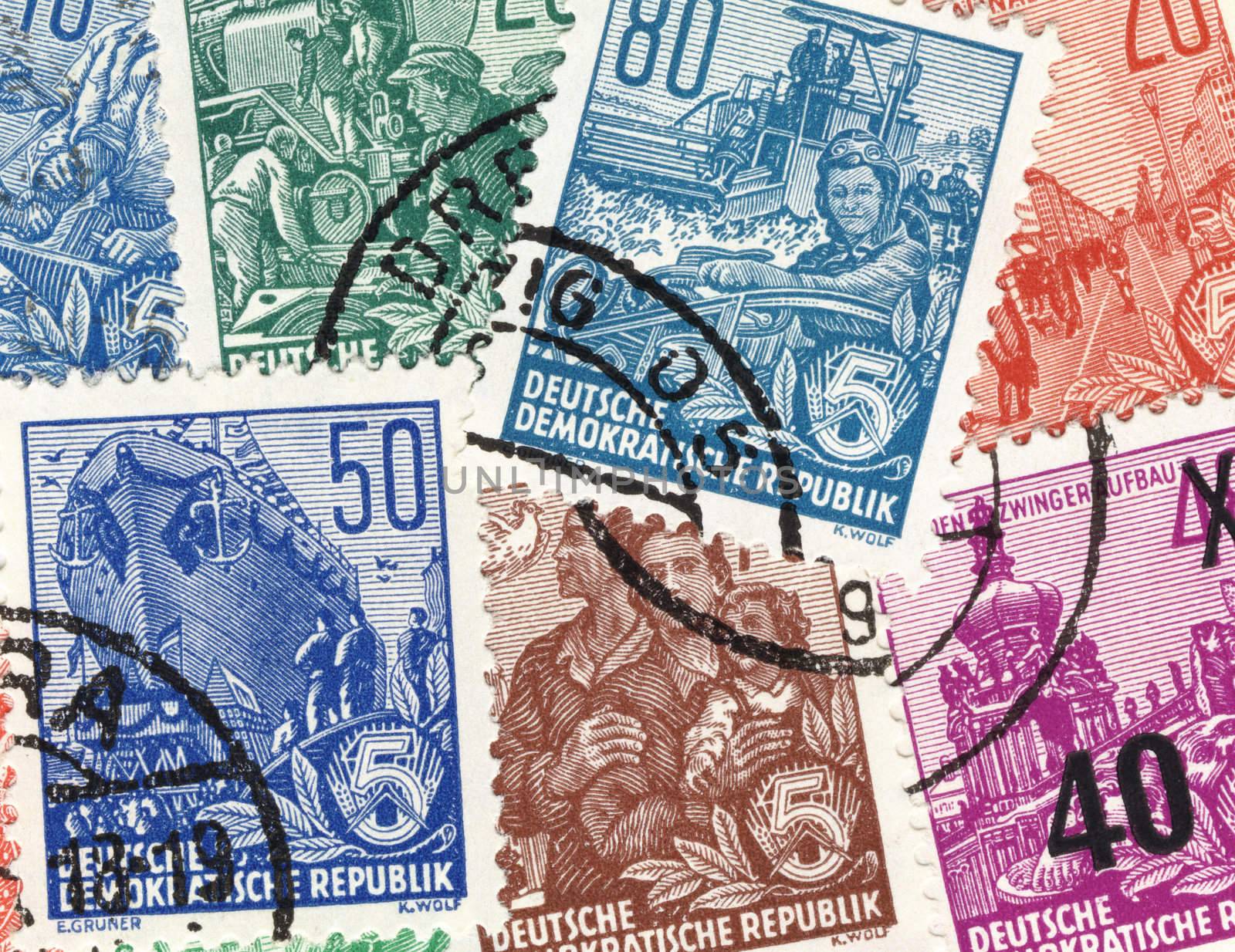 collage of old german stamps from german democratic republic