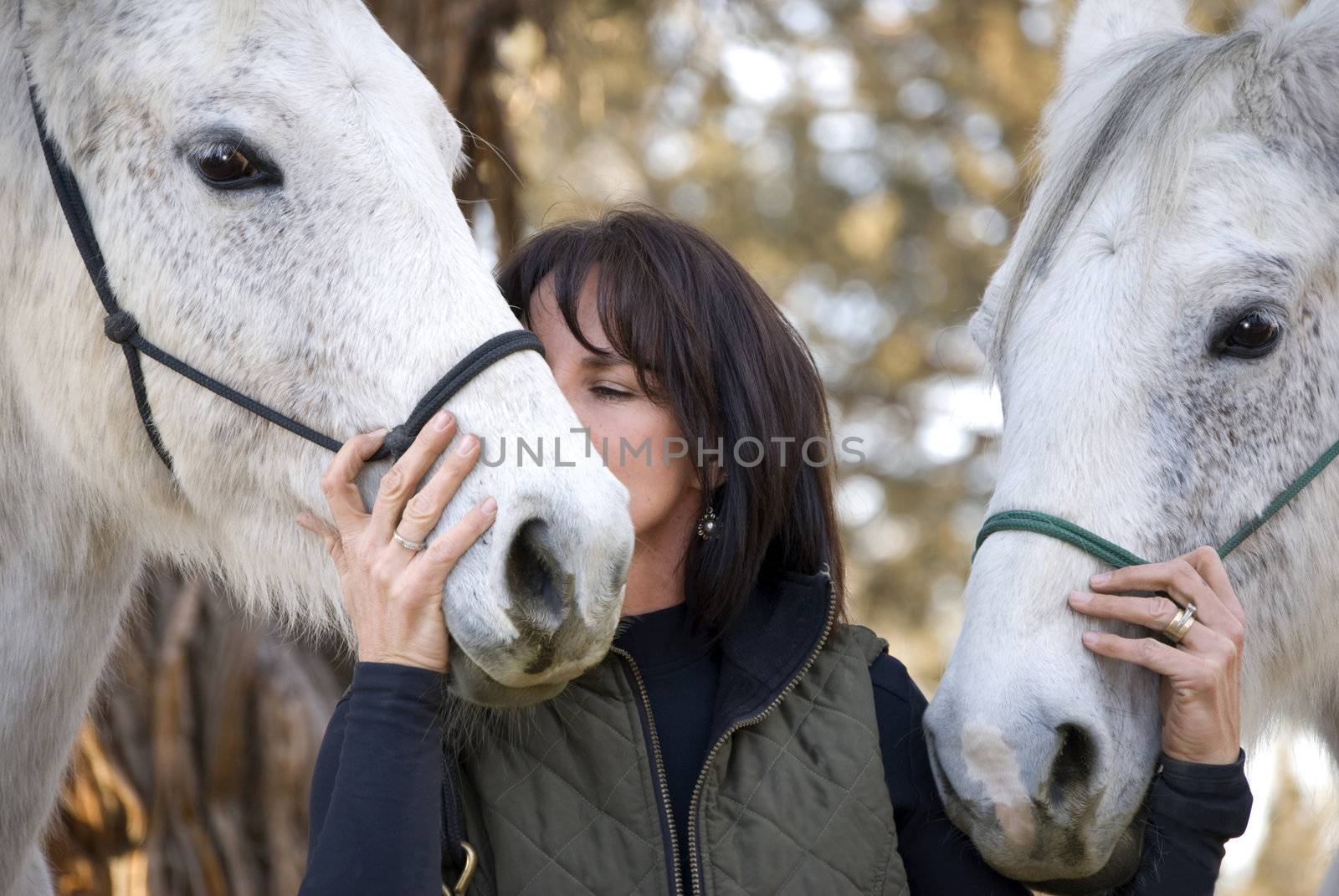 Woman Showing Affection to her Horses by Eponaleah