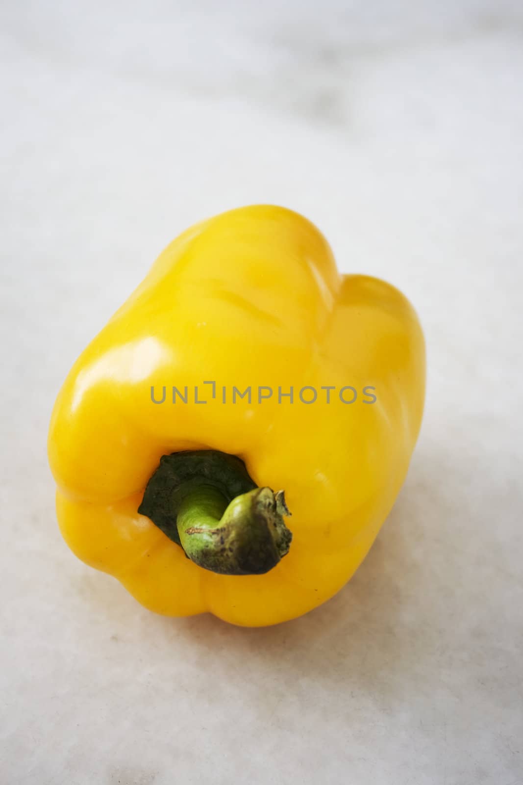 Yellow Pepper on Mable Background