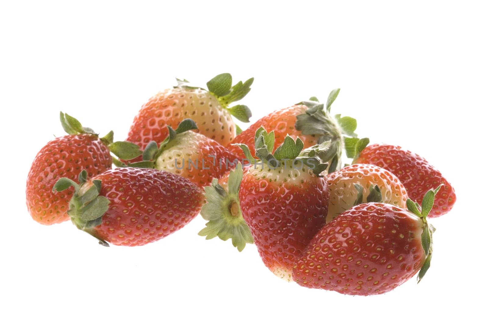 Isolated macro image of strawberries.