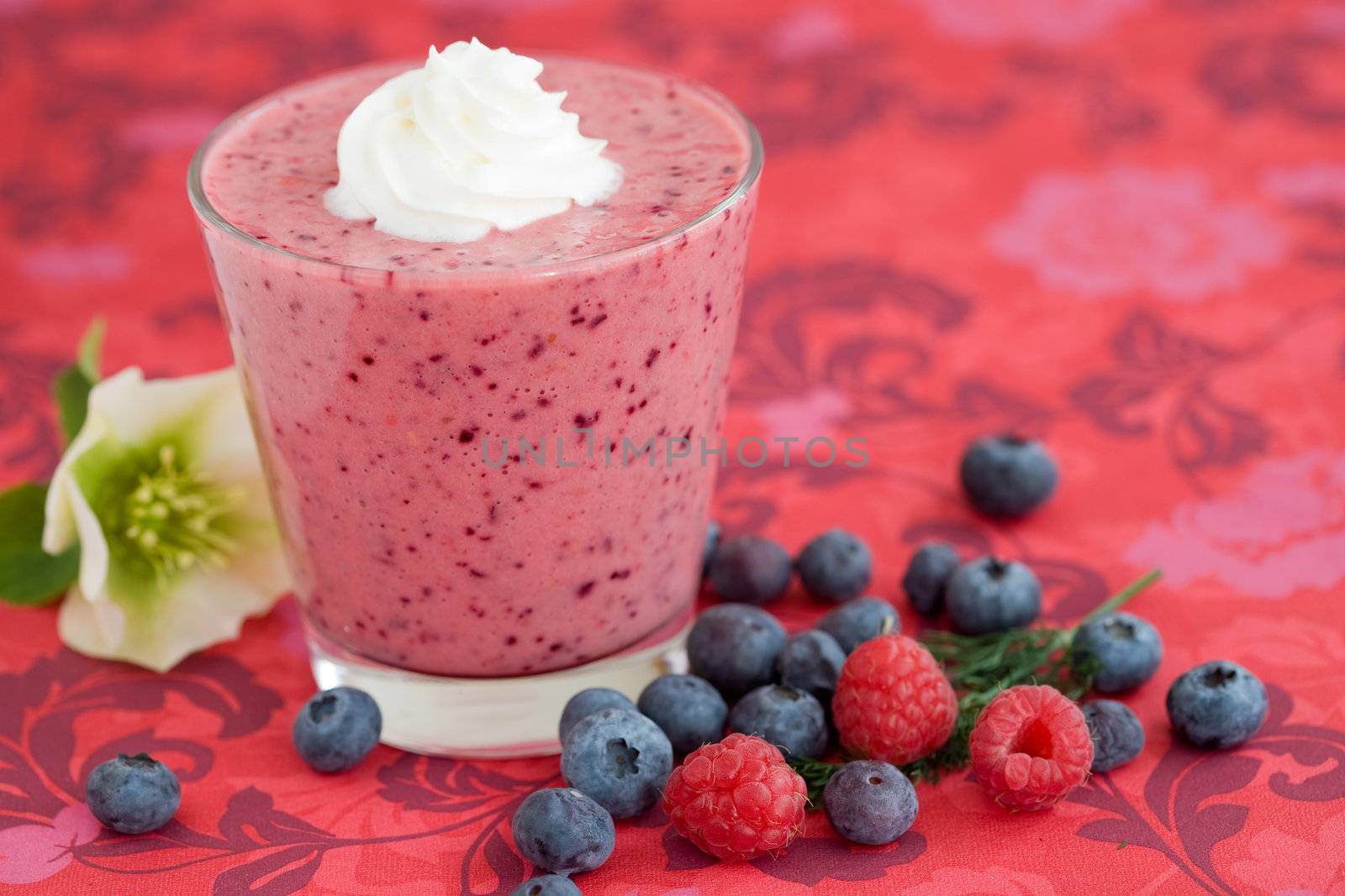 Delicious smoothie with raspberries and blueberies
