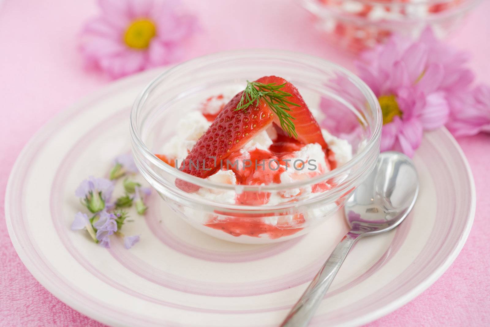 Delicious dessert with strawberries and flowers
