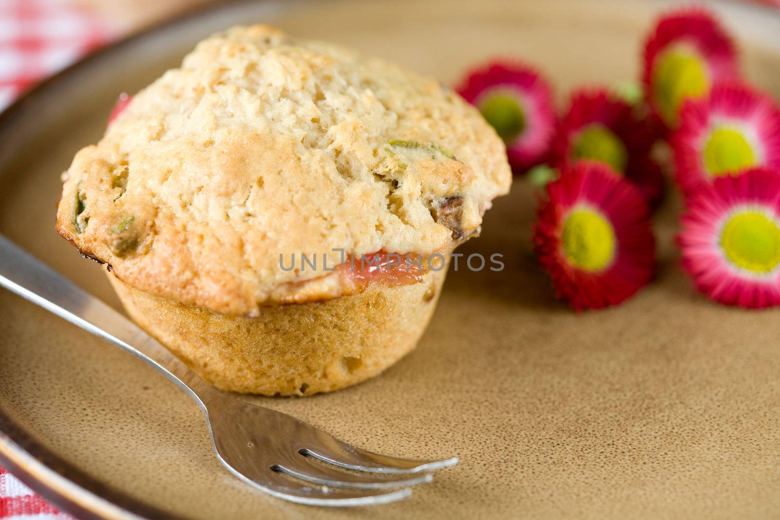 Delicious muffin filled with rhubarb and pistachio nuts