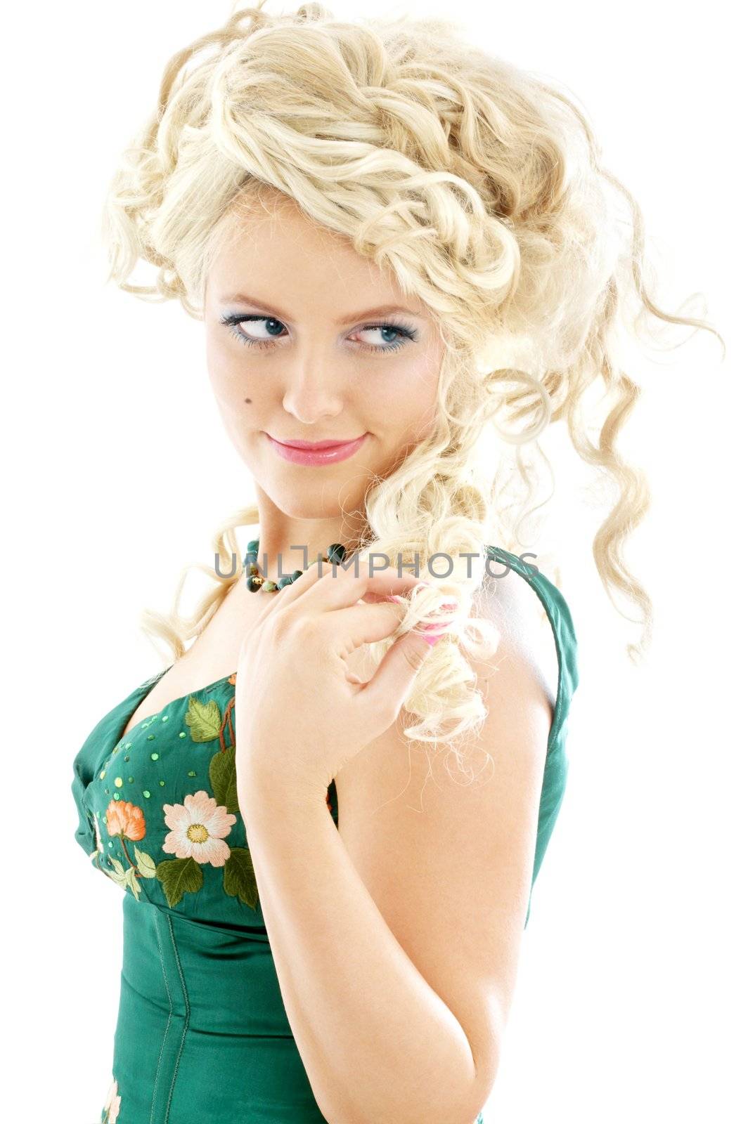 image of blond in green dress over white