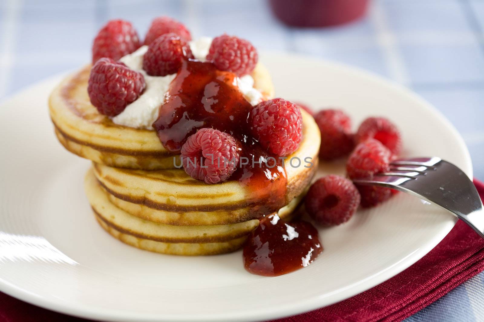 Delicious pancakes with ricotta and raspberries