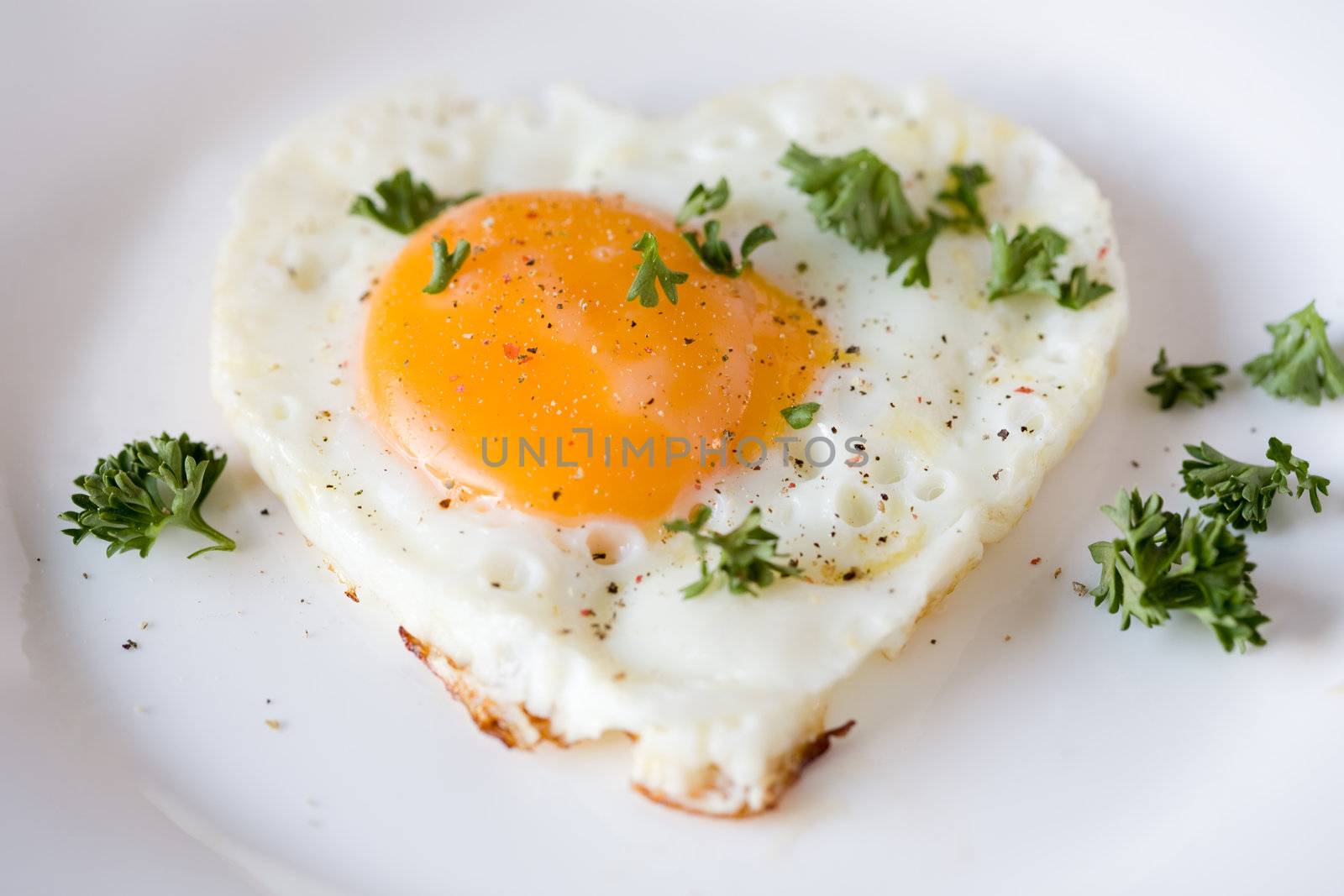 Fried egg in the shape of a heart
