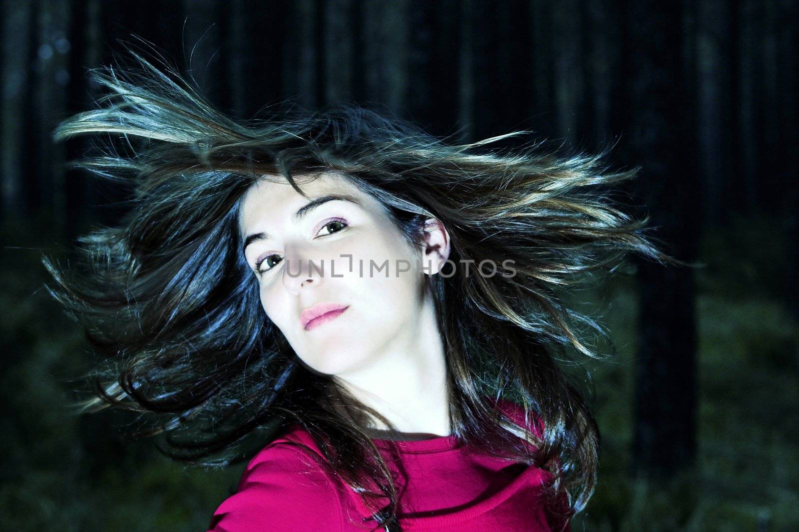 Woman portrait moving is hair 
