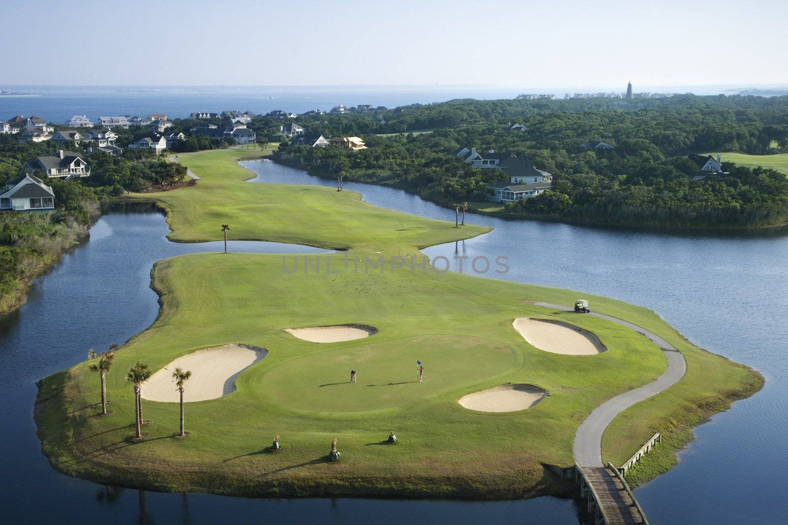 Aerial view of golf course in coastal residential community at Bald Head Island, North Carolina.