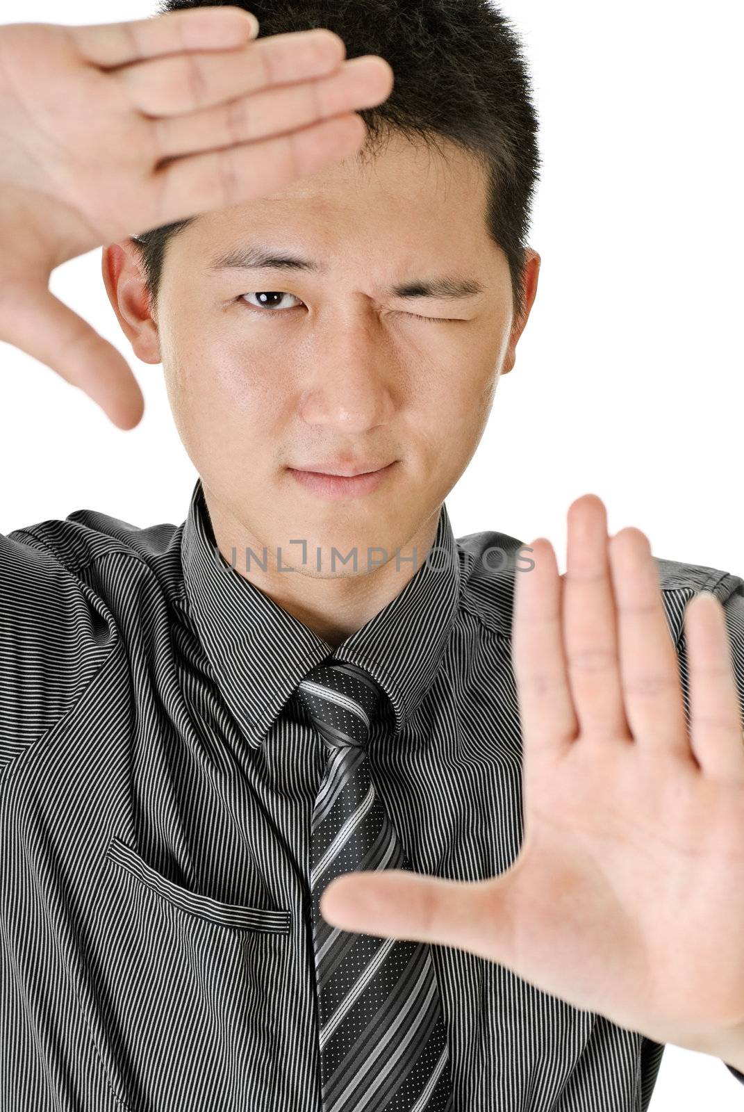 Business man make frame by hands, closeup portrait of Asian on white background.