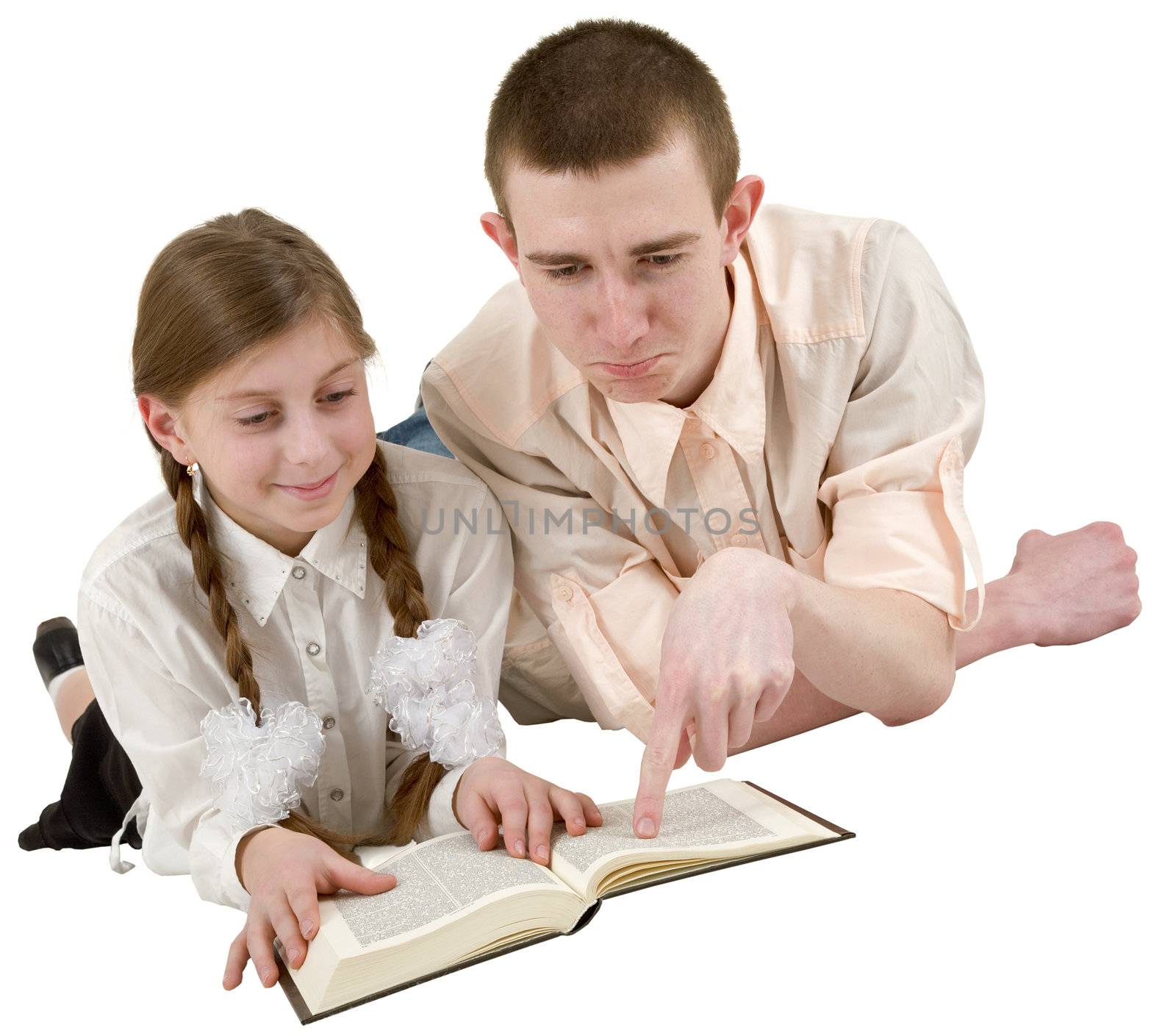 Young man and girl reading book on white