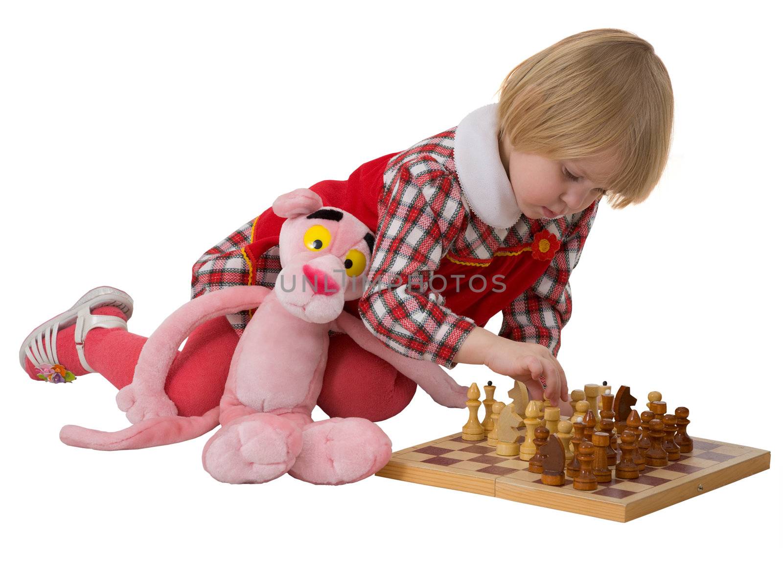 Little girl play chess by pzaxe