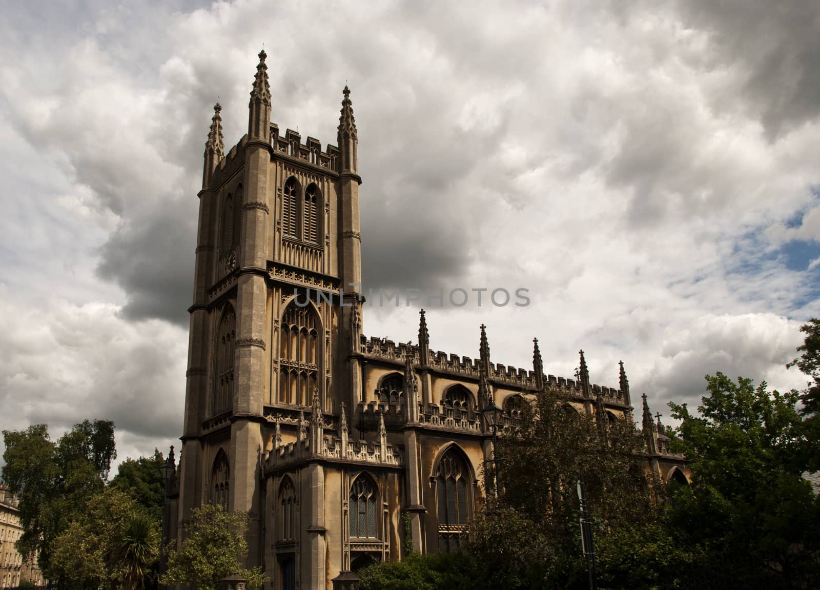An english church with cloudy sky above