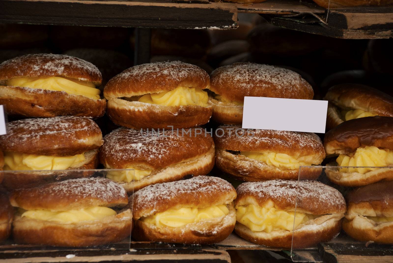 Dounuts with a sign in a market