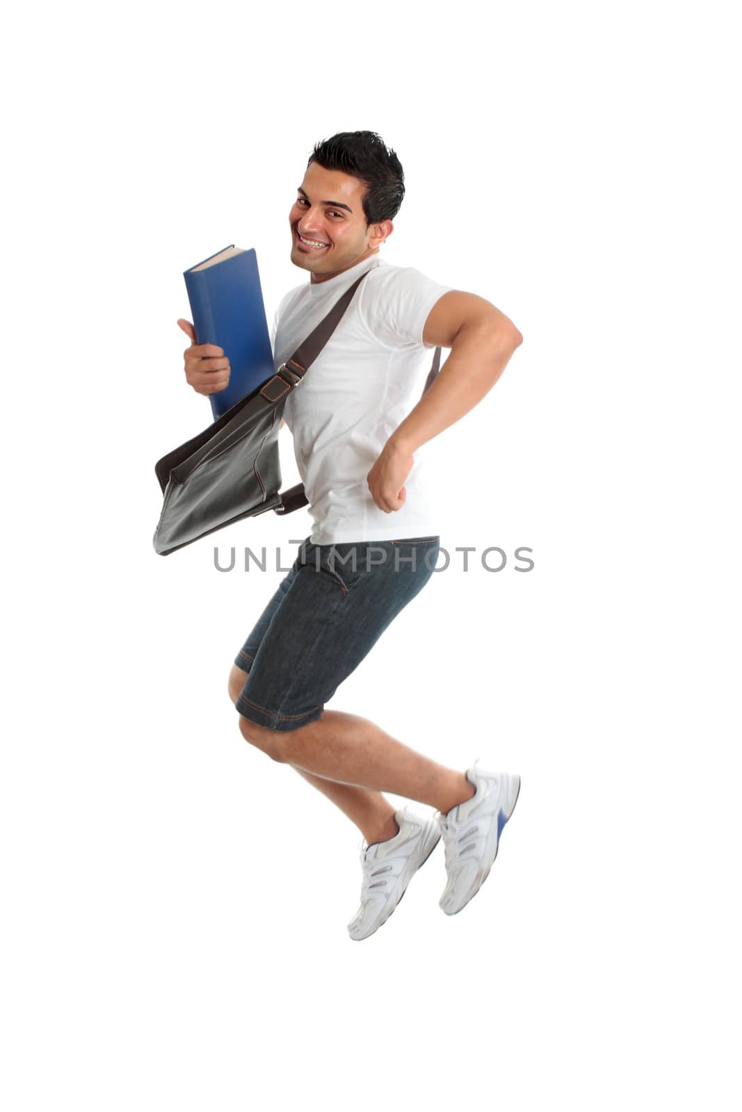 A happy thrilled excited university or college student jumping into the air.  Some motion in legs.  White background.