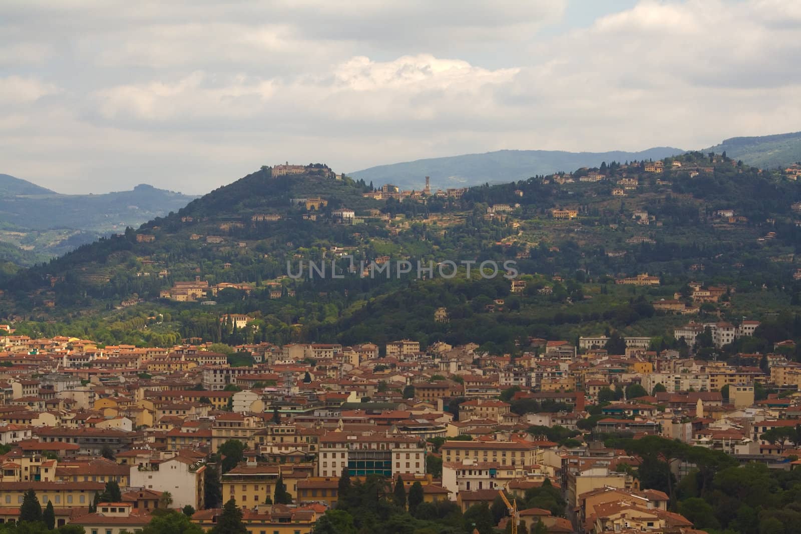 Overview of Florence, with towers and hills on the distance