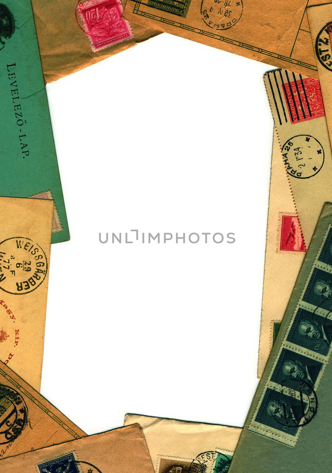 frame of vintage grungy postcards and envelopes