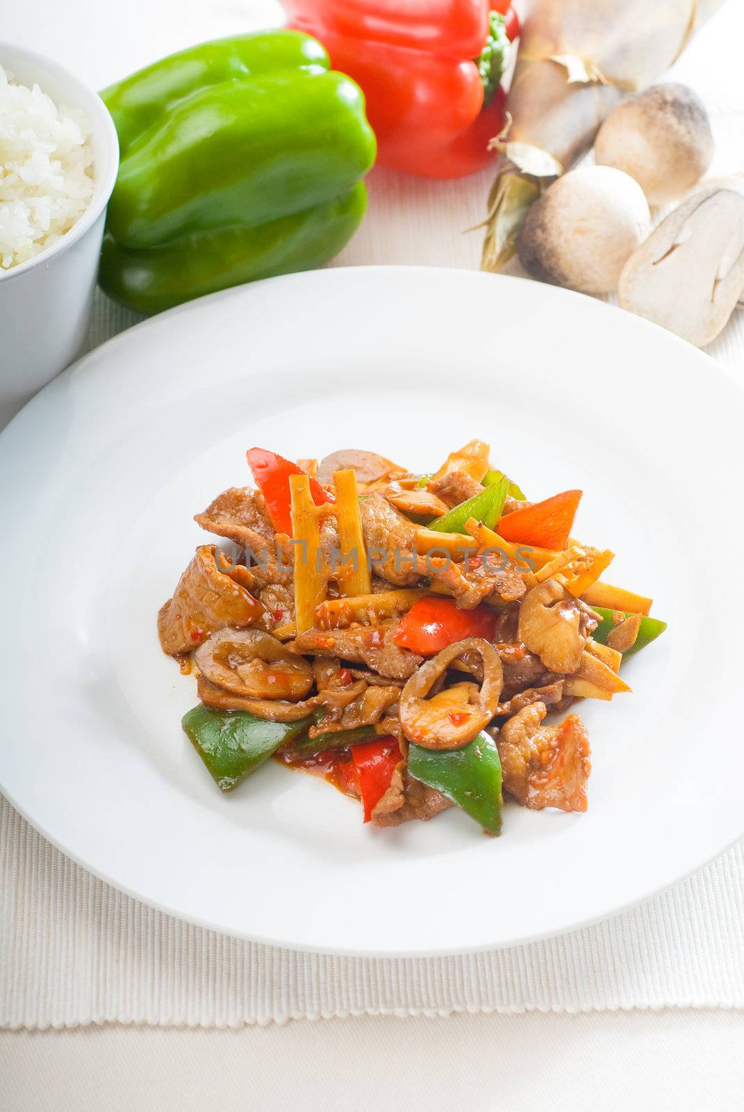 typical chinese dish,fresh beef stir fried with pepperrs bamboo sprout and mushrooms