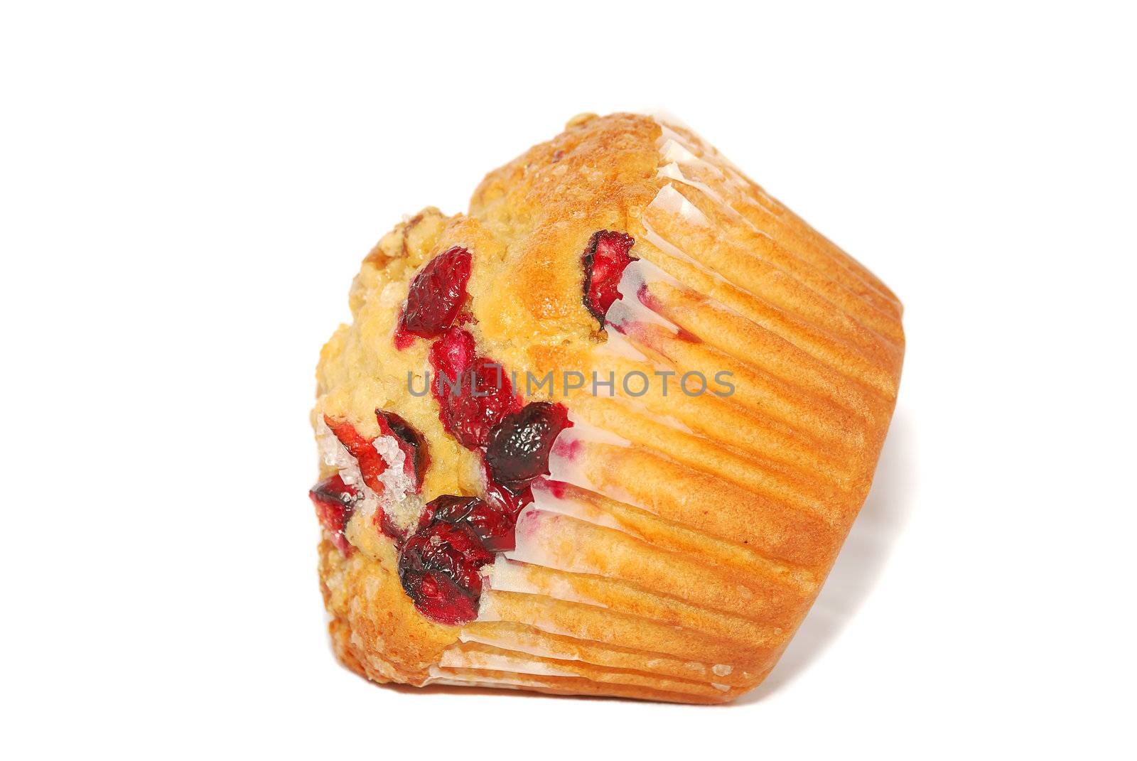 Fresh cranberry muffin close-up isolated on the white.