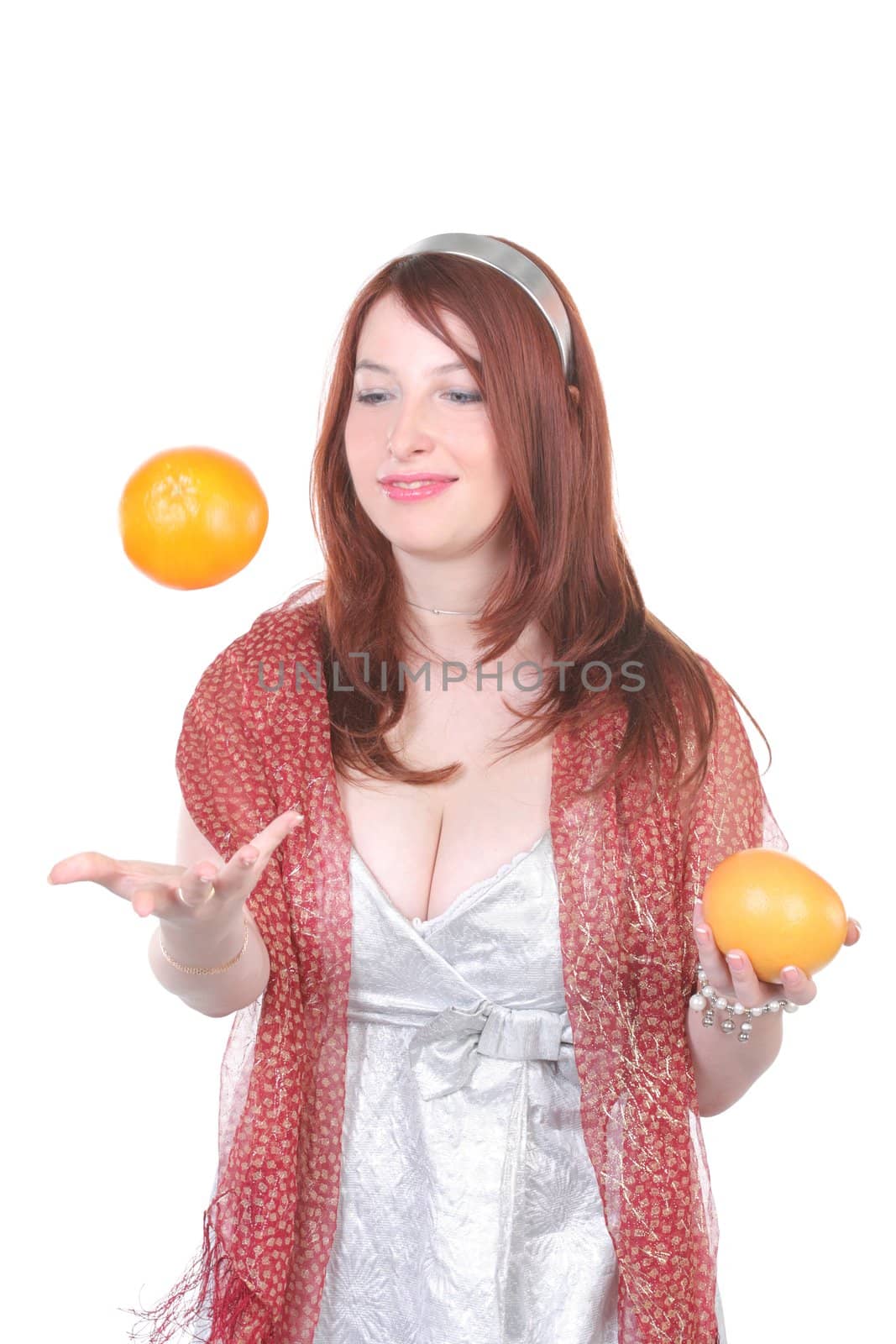 beautiful girl and flying orange on white background