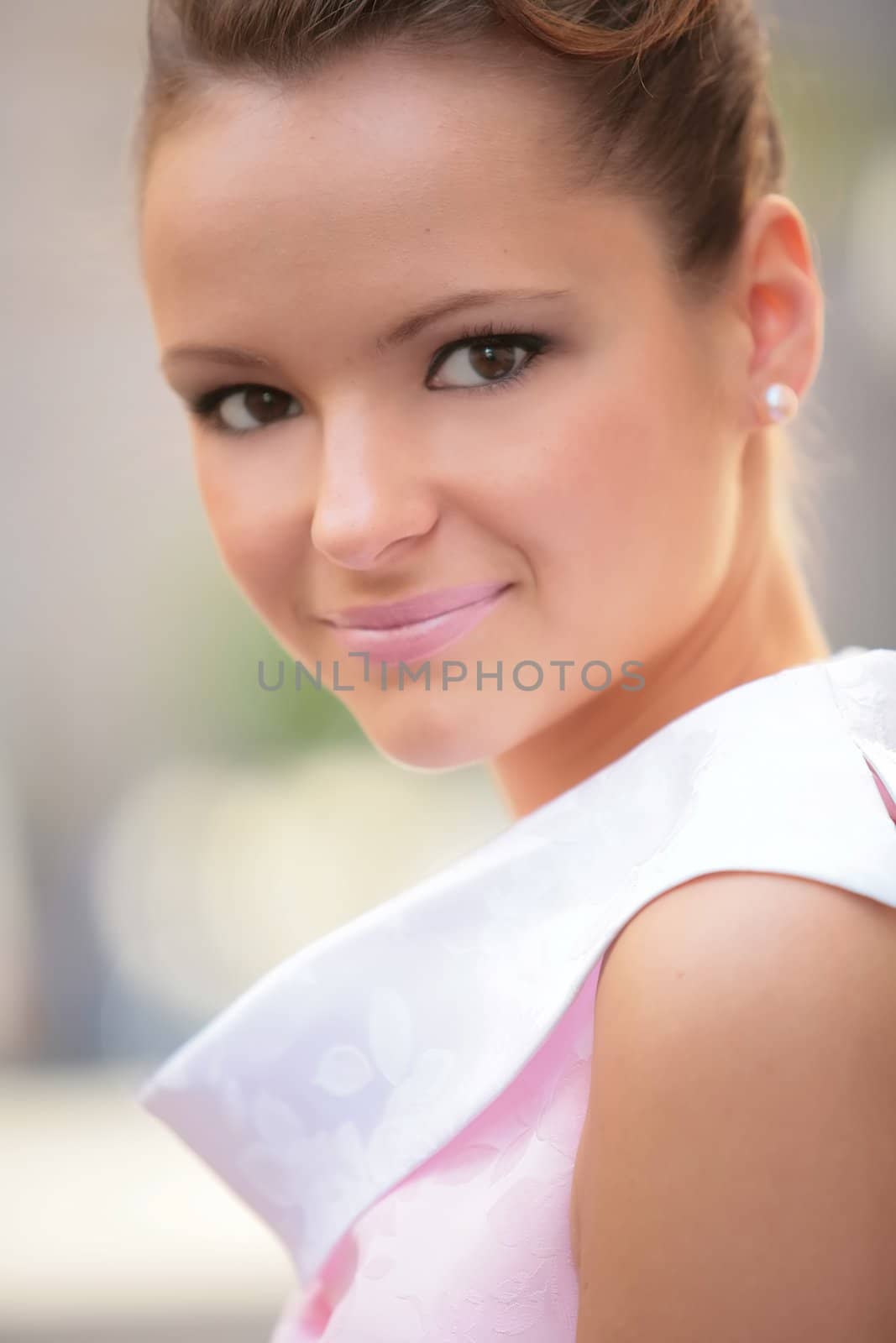 closeup portrait of the girl in vintage white-rose dress and necklace from pearl