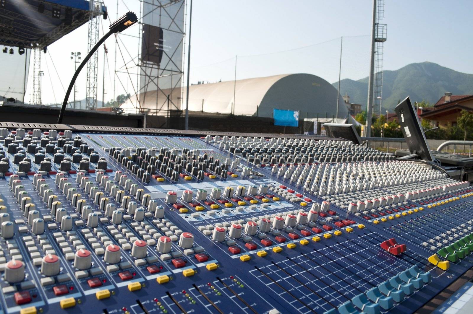 Big mixer console in a concert stage