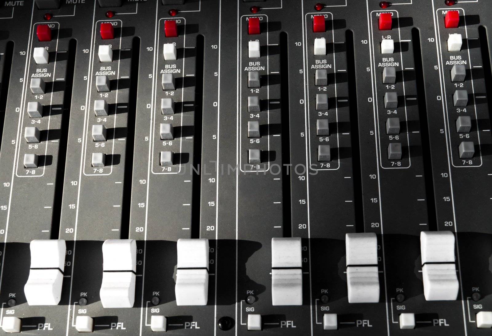 big mixer console in a concert stage