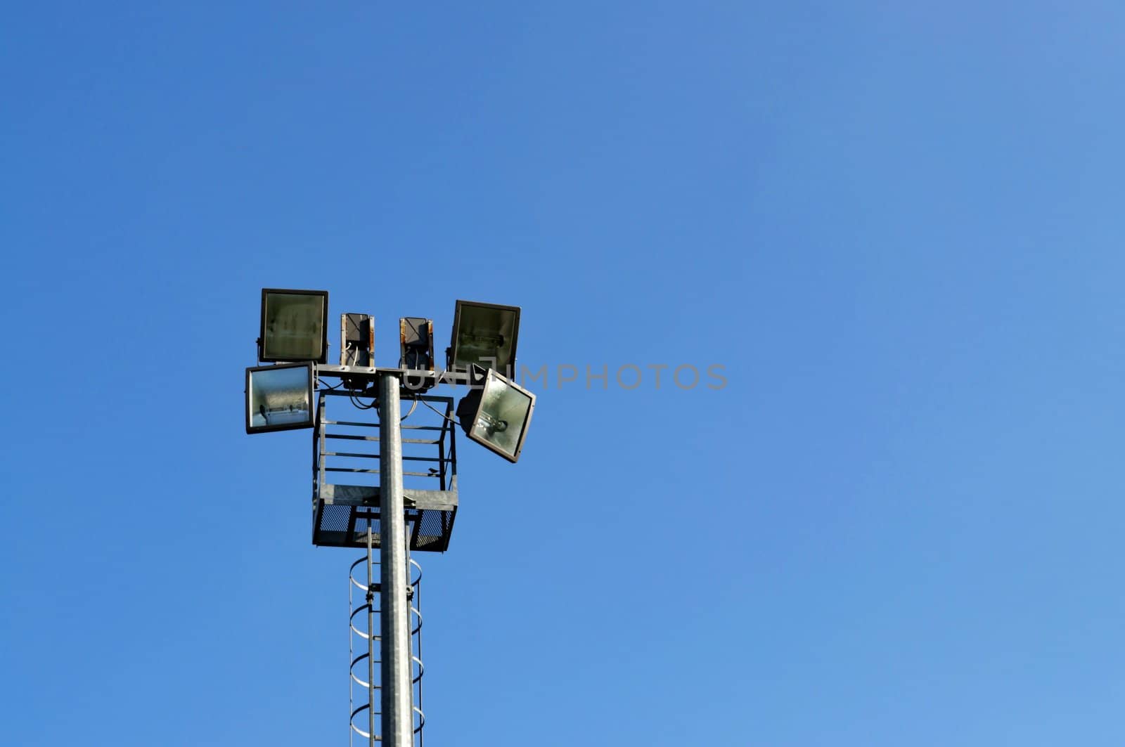 Stadium reflector on a blue sky background