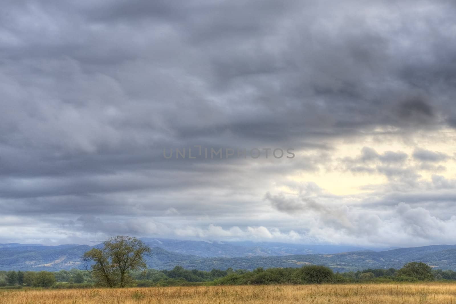 Landscape with a dramatic sky