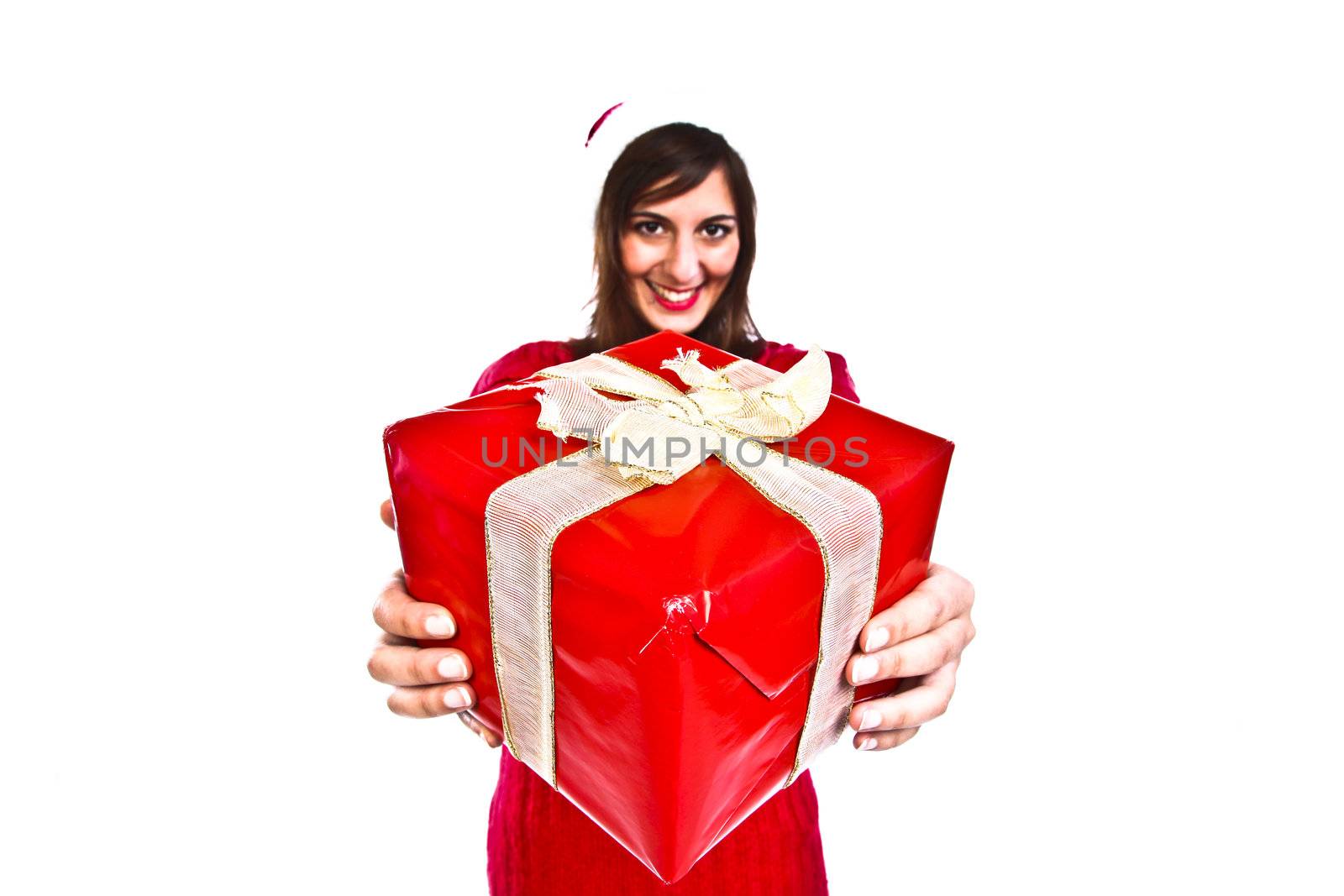 Happy Young Santa Girl Offering A Big Packed Present