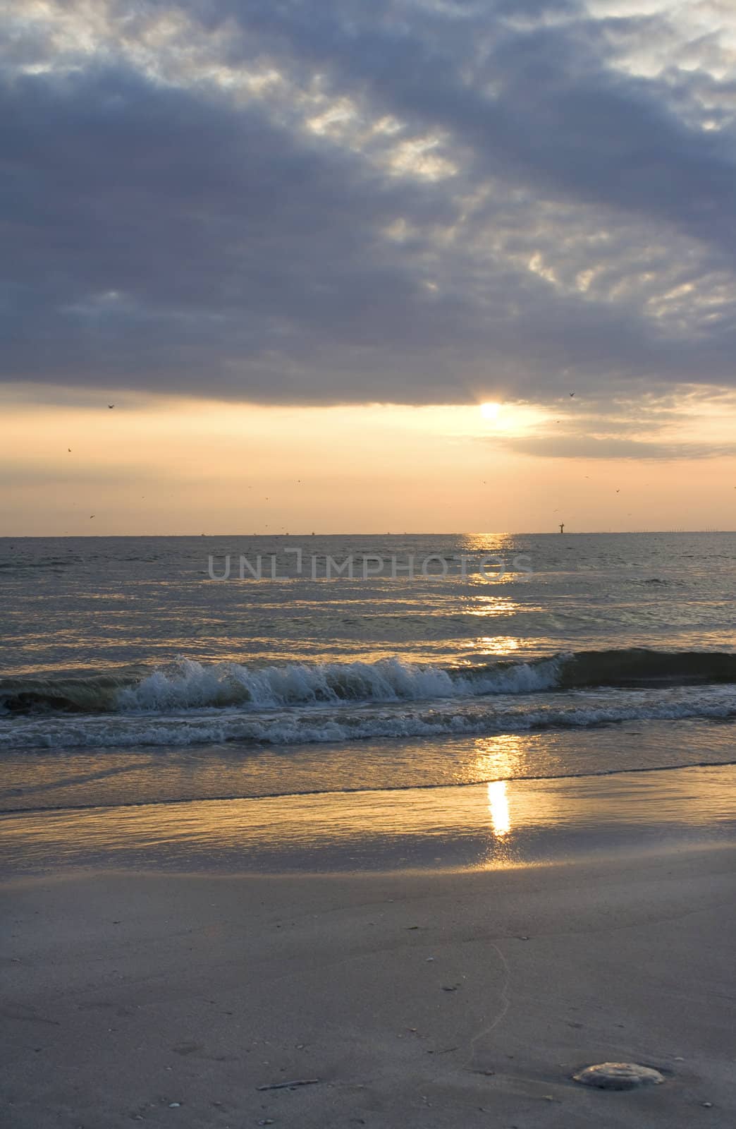 Sunset at beach by gigra