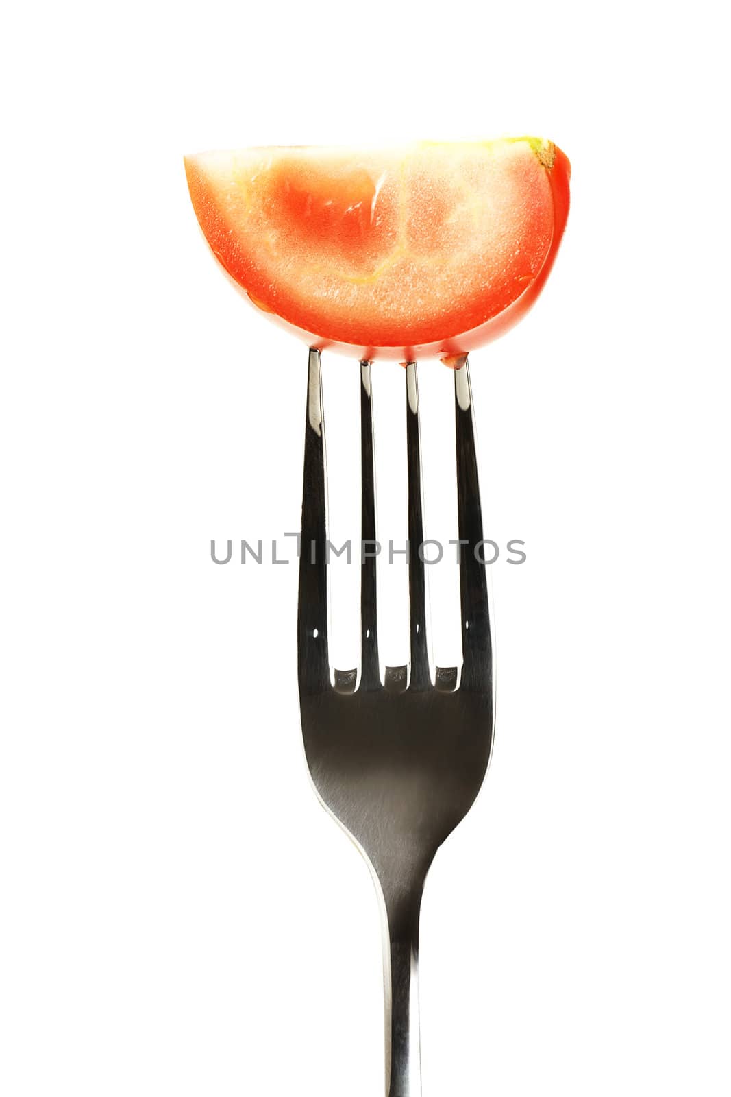 one tomato on a fork on white background