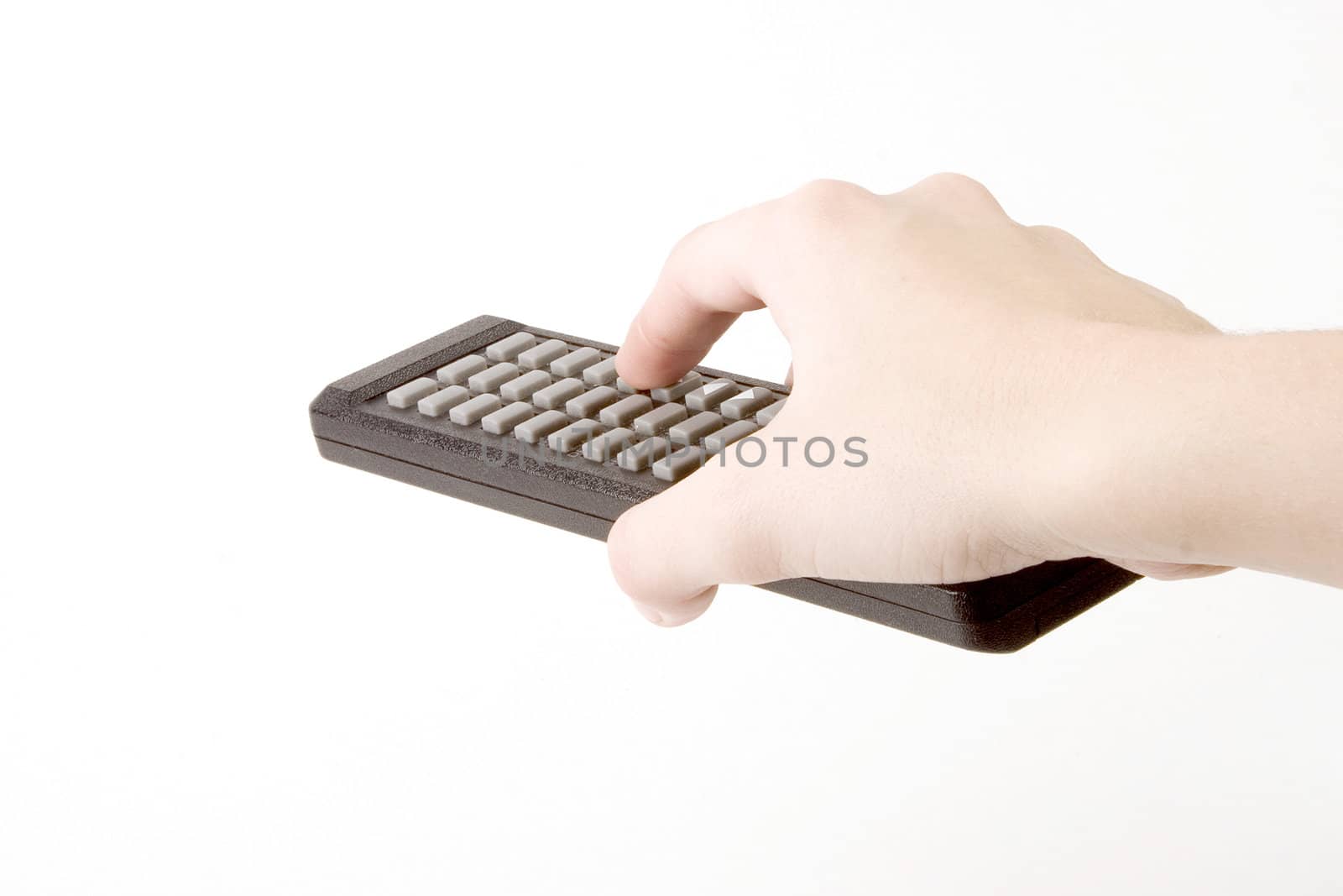 Hand holding a remote