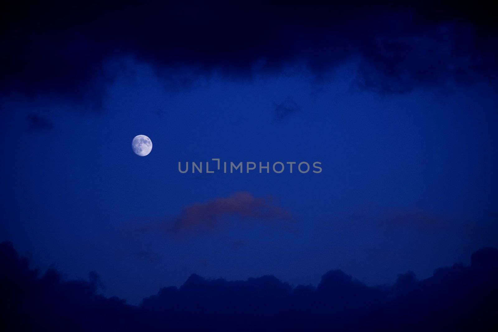 Moon on a dark blue sky