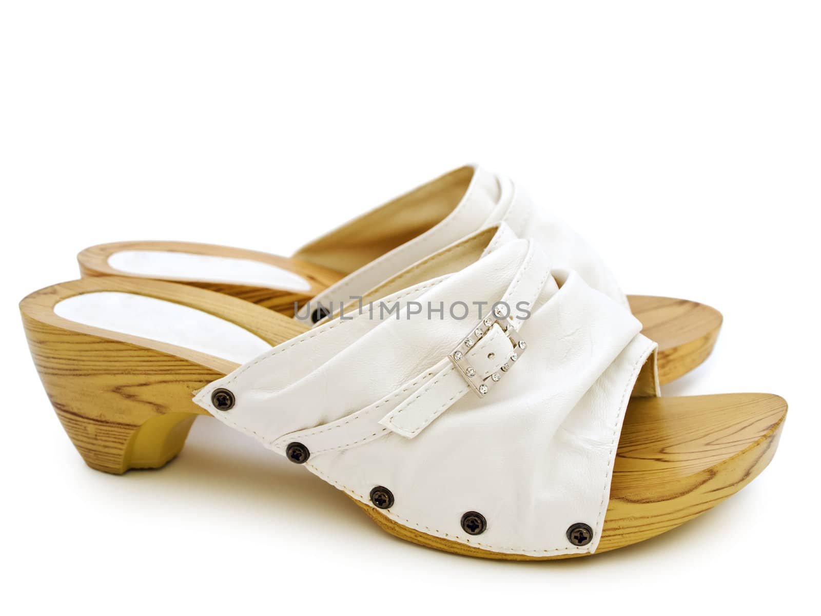 woman's summer white shoes over white background 