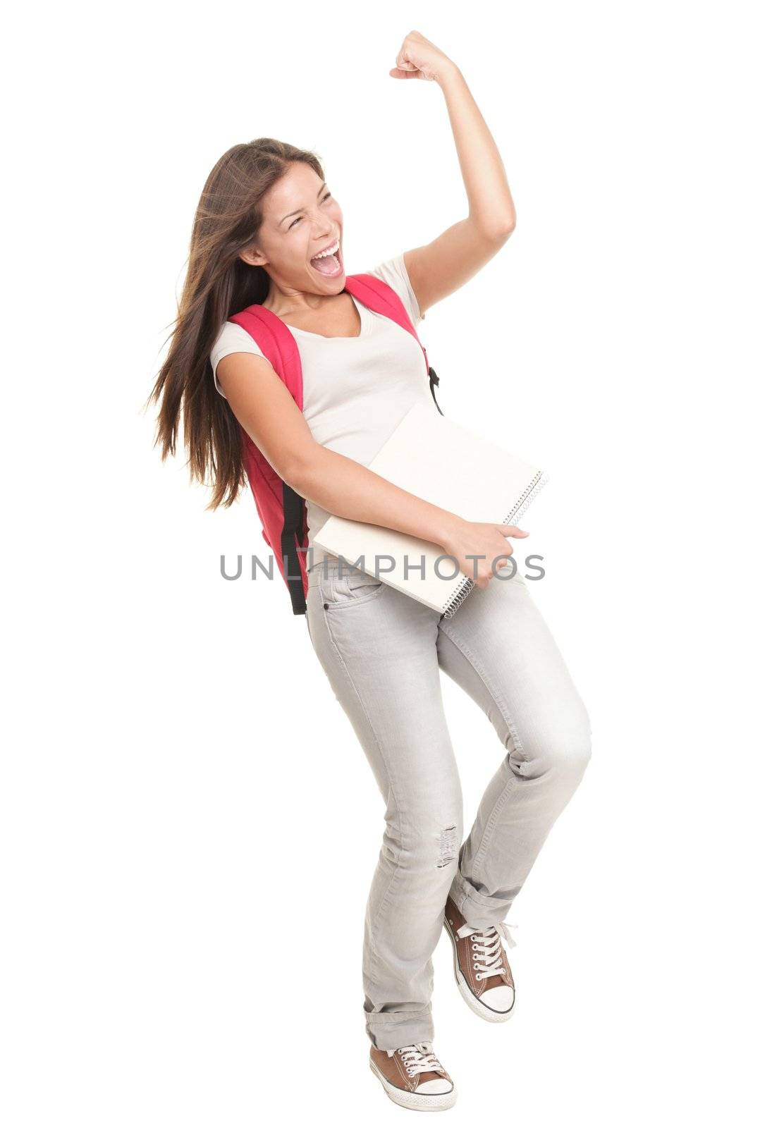 Happy woman college student winner celebrating isolated on white background in full length. Mixed race Chinese Asian / Caucasian female university student. 