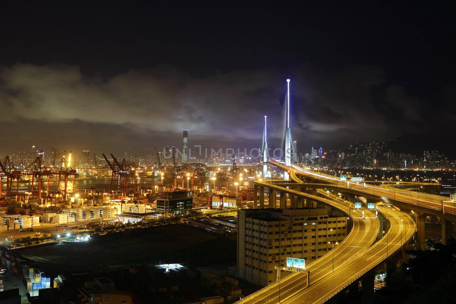 container terminal and bridge in Hong Kong at night