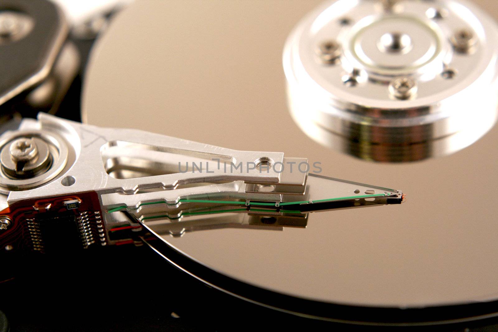 an open computer harddrive showing the disc platters inside