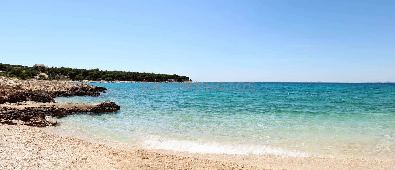 Panorama of beautiful beach in Croatia with rocks