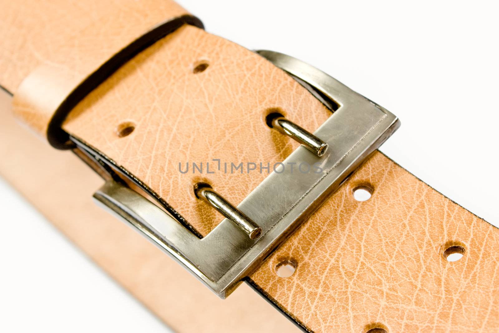 A yellow  leather belt isolated on white background