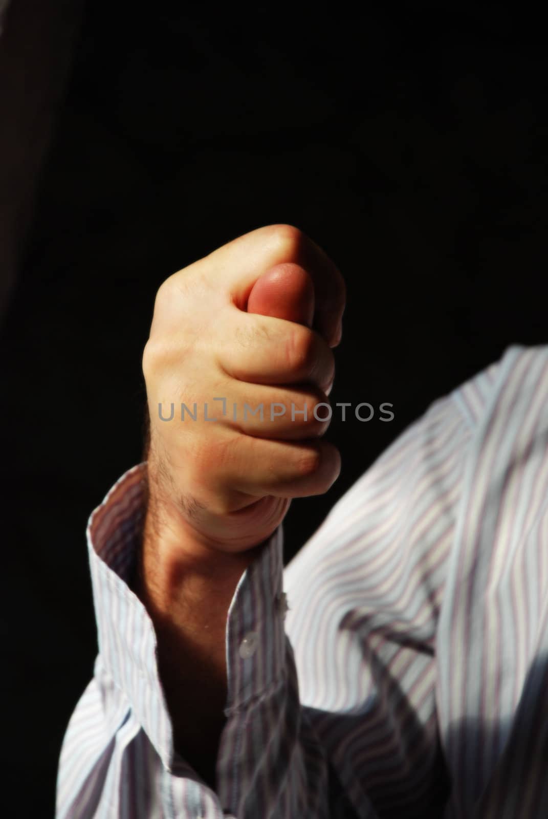 a man's fist showing a fico
