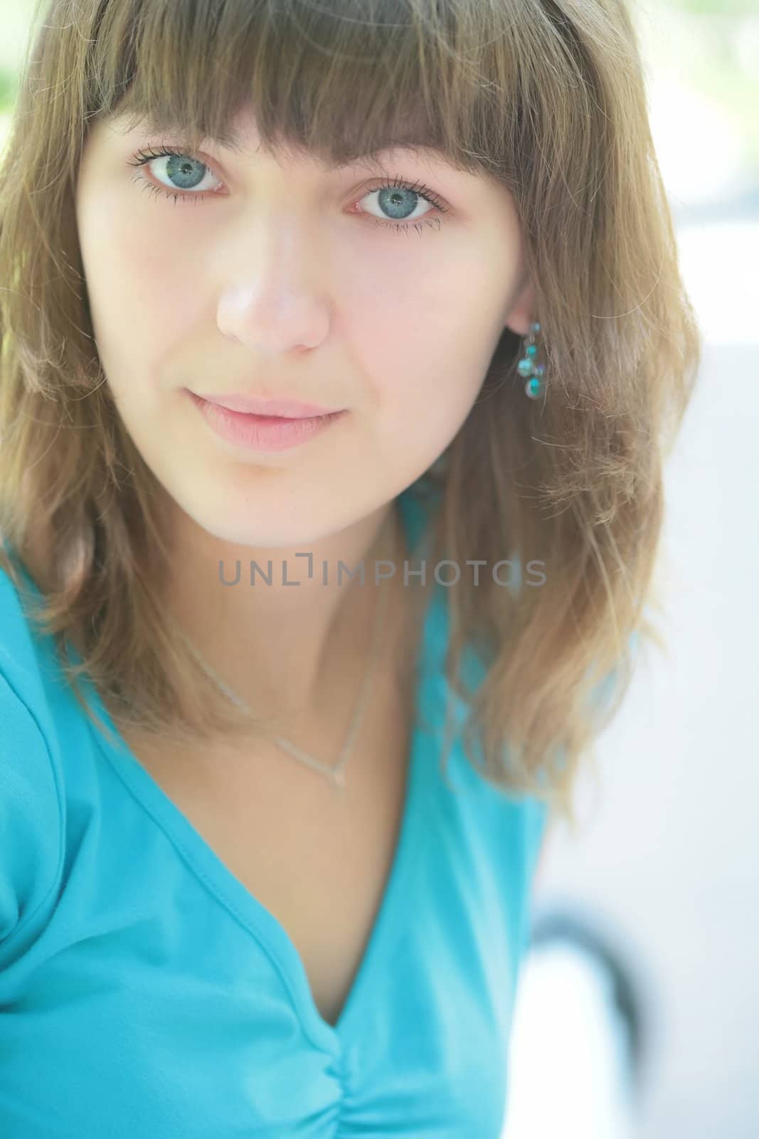 green-eyed girl in blue t-shirt by Astroid