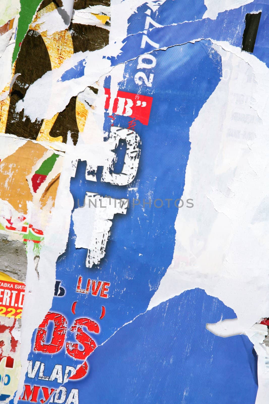 Texture, Varicoloured Concrete Wall with Scrap of the Posters and Announcements, Background