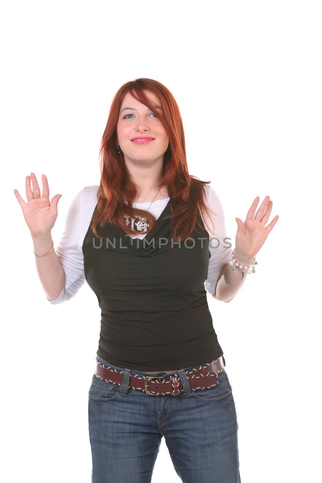 european girl in jeans dances on white background