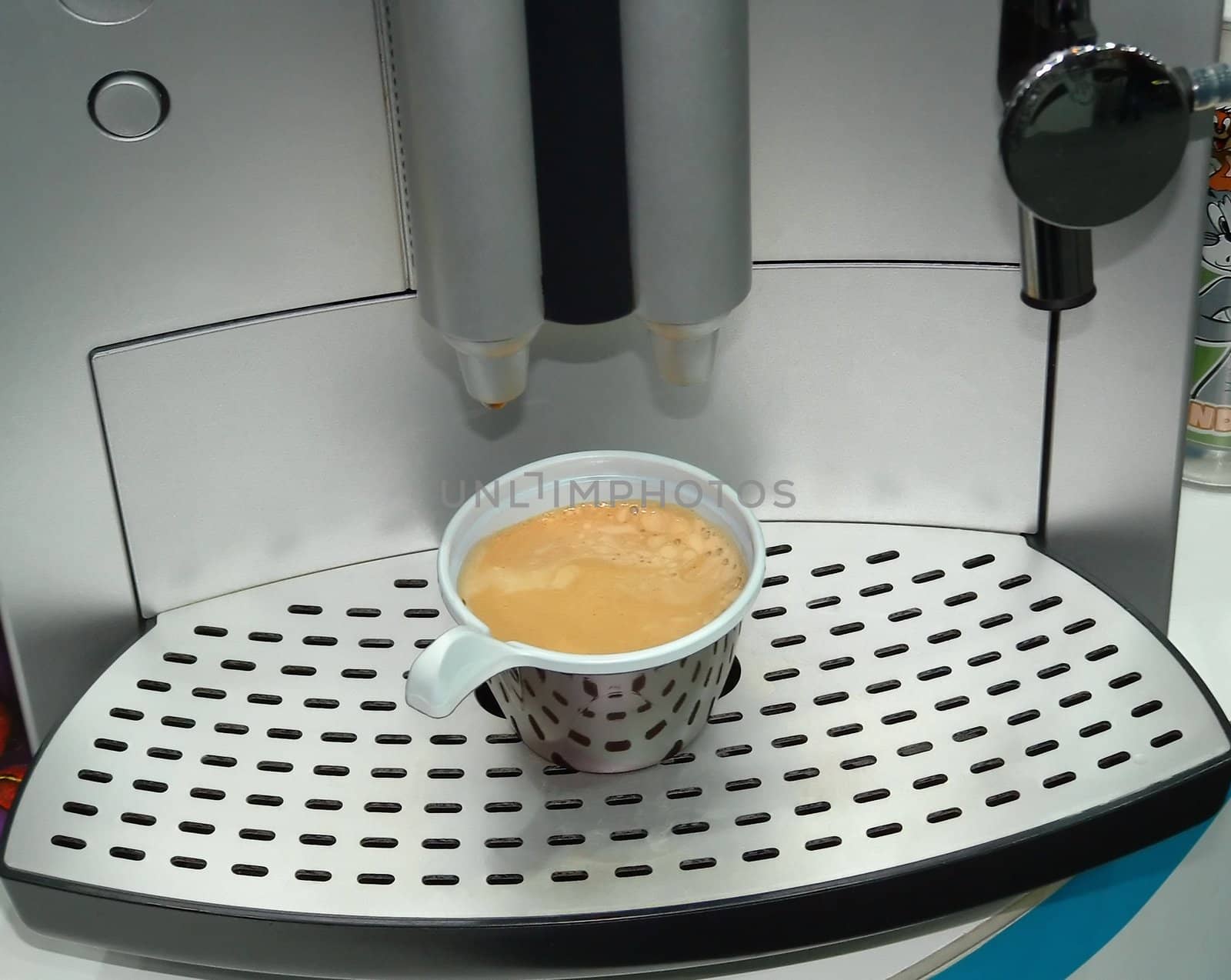 Image of an automatic electric coffee maker for preparation cappuccino