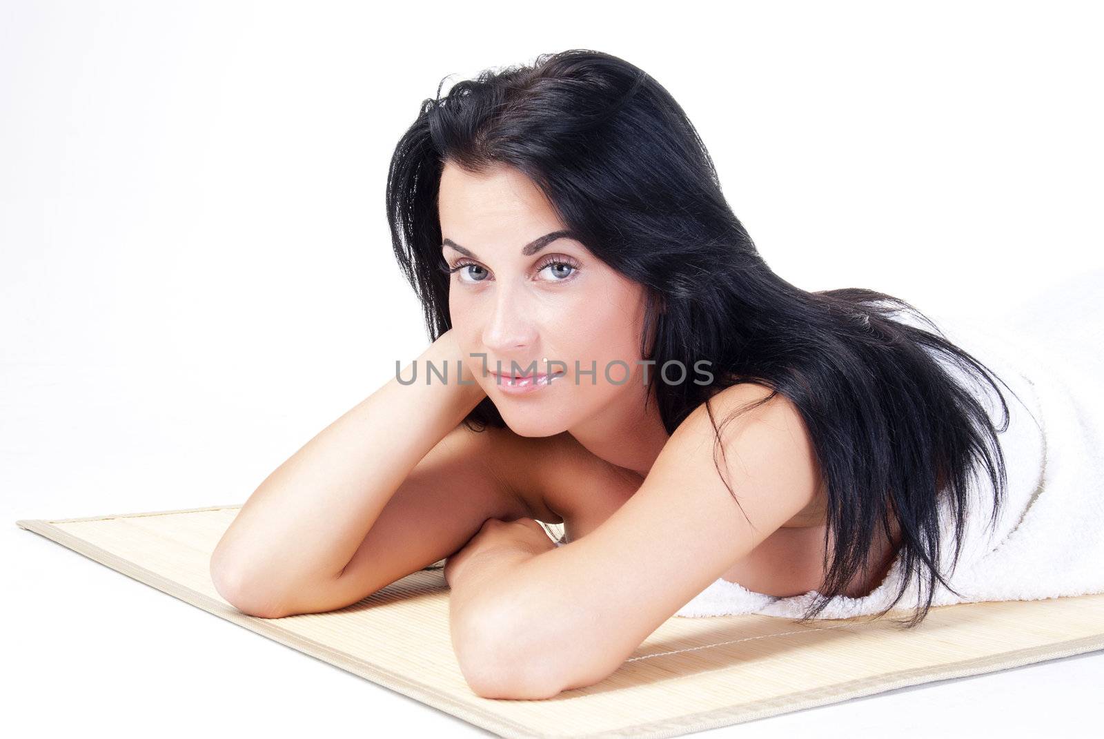 beautiful lady relaxing in spa by oblickstudio